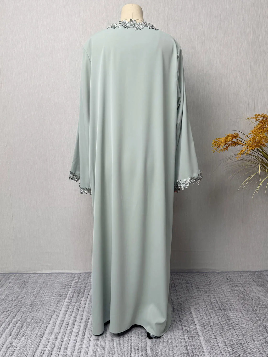 Green Muslim Abaya Long length Robe with Artistic Leaf Embroidery for Women Seeking a Blend of Traditional and Stylish Design