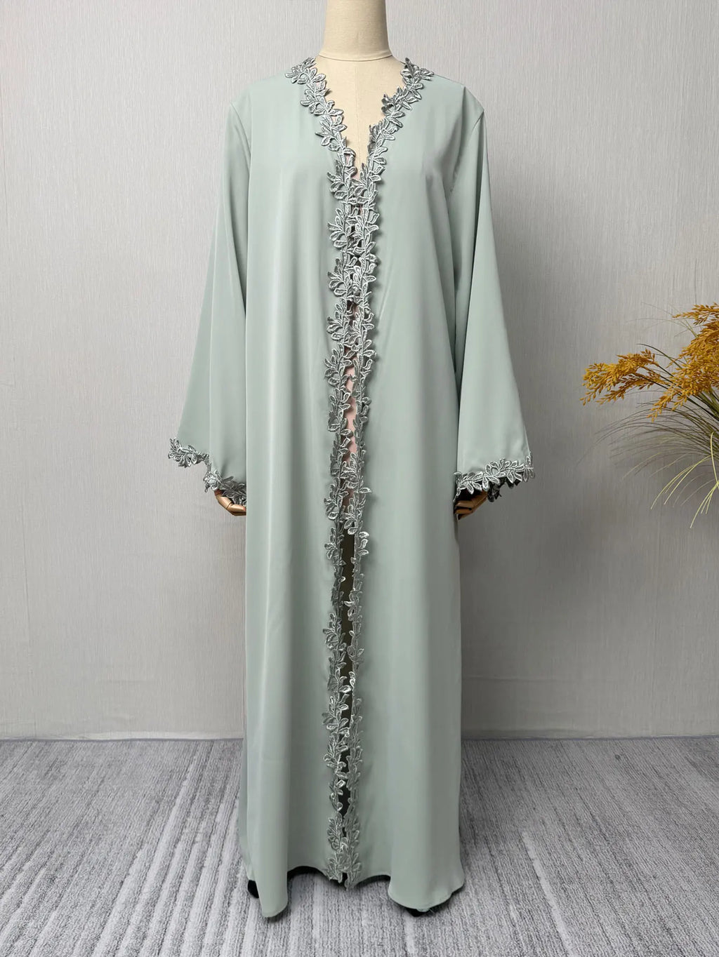 Green Muslim Abaya Long length Robe with Artistic Leaf Embroidery for Women Seeking a Blend of Traditional and Stylish Design