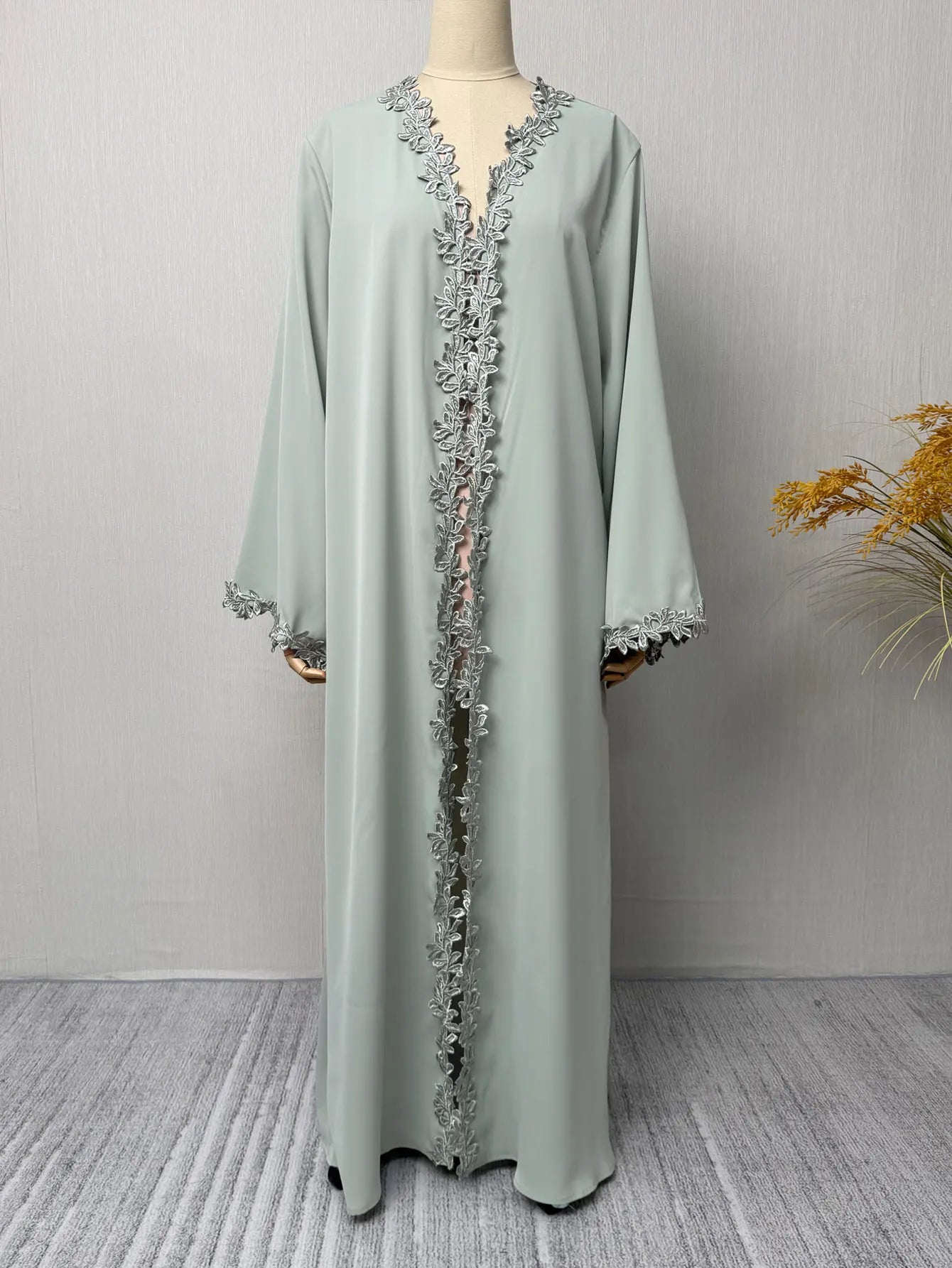 Green Muslim Abaya Long length Robe with Artistic Leaf Embroidery for Women Seeking a Blend of Traditional and Stylish Design
